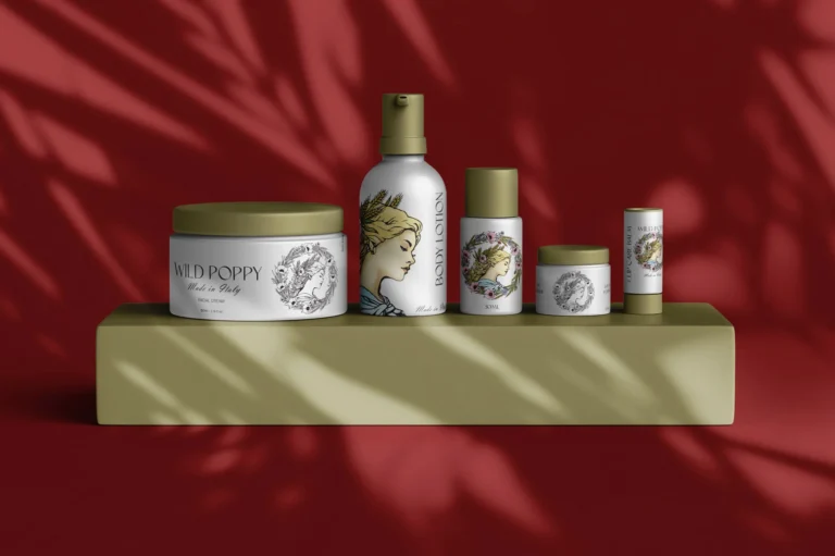 Grup de recipiente pentru produse cosmetice Wild Poppy, incluzând creme și loțiuni personalizate cu ilustrații elegante, așezate pe un piedestal măsliniu pe fundal roșu cu umbre, realizat de FloBold. premium packaging design.